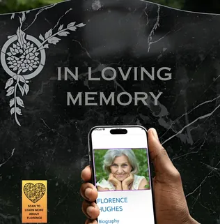 Headstone reading In Loving Memory, with a phone held up showing Florence's memorial page