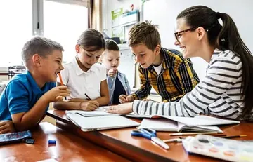 Children learning with teacher